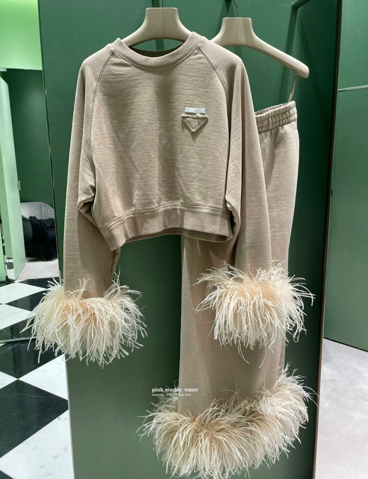 Crew-neck sweatshirt with feather trim