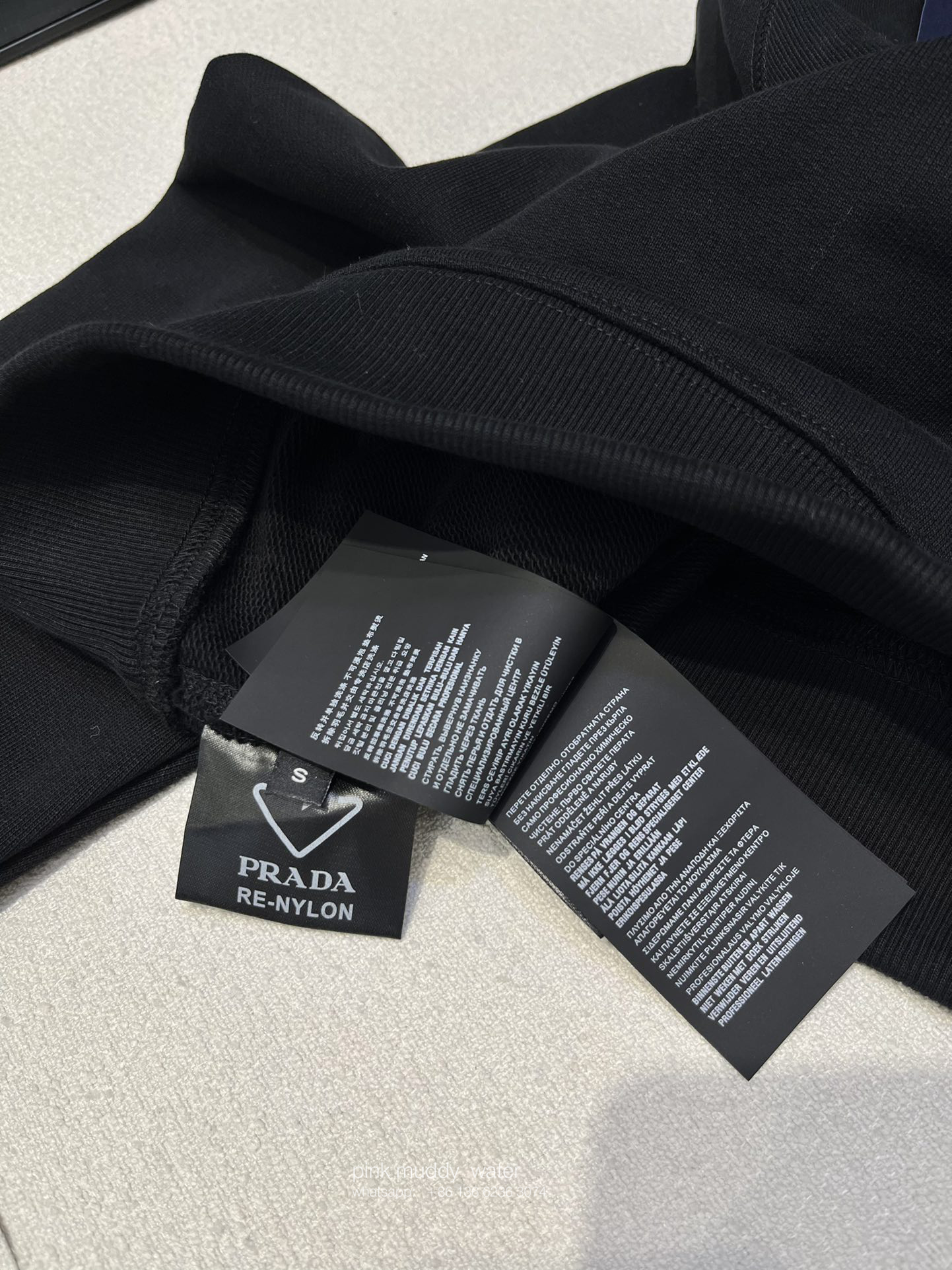 Crew-neck sweatshirt with feather trim