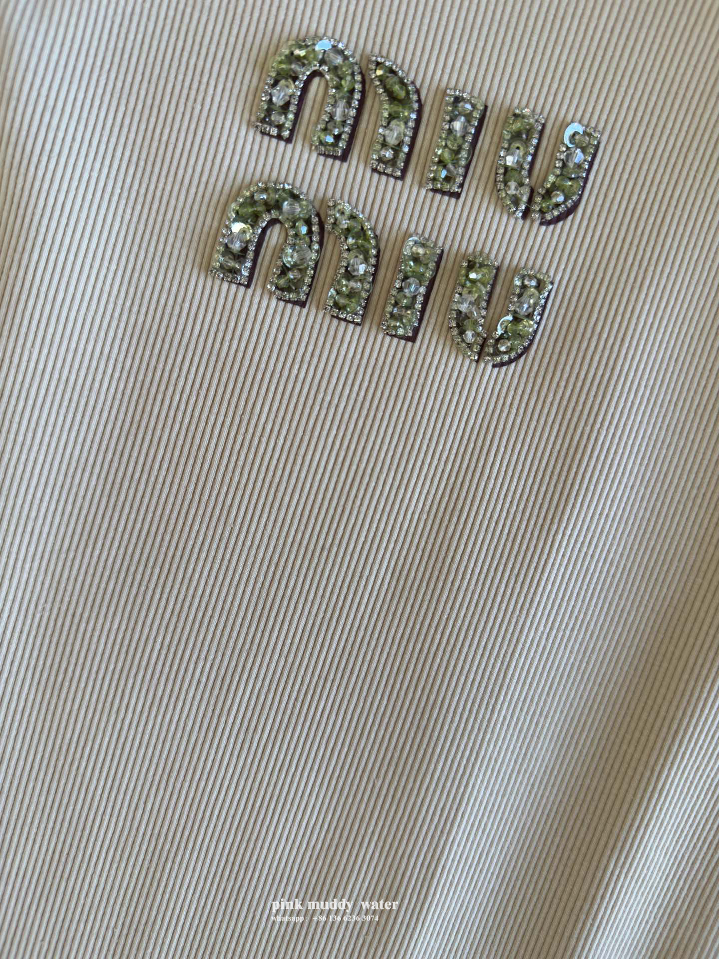 Rib knit top with embroidered logo