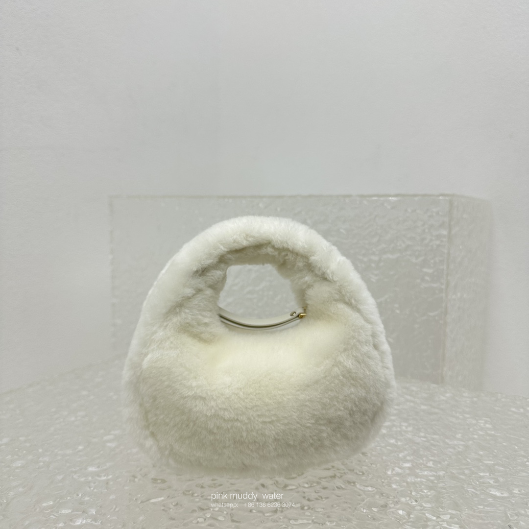 Wander leather detail shearling crescent bag