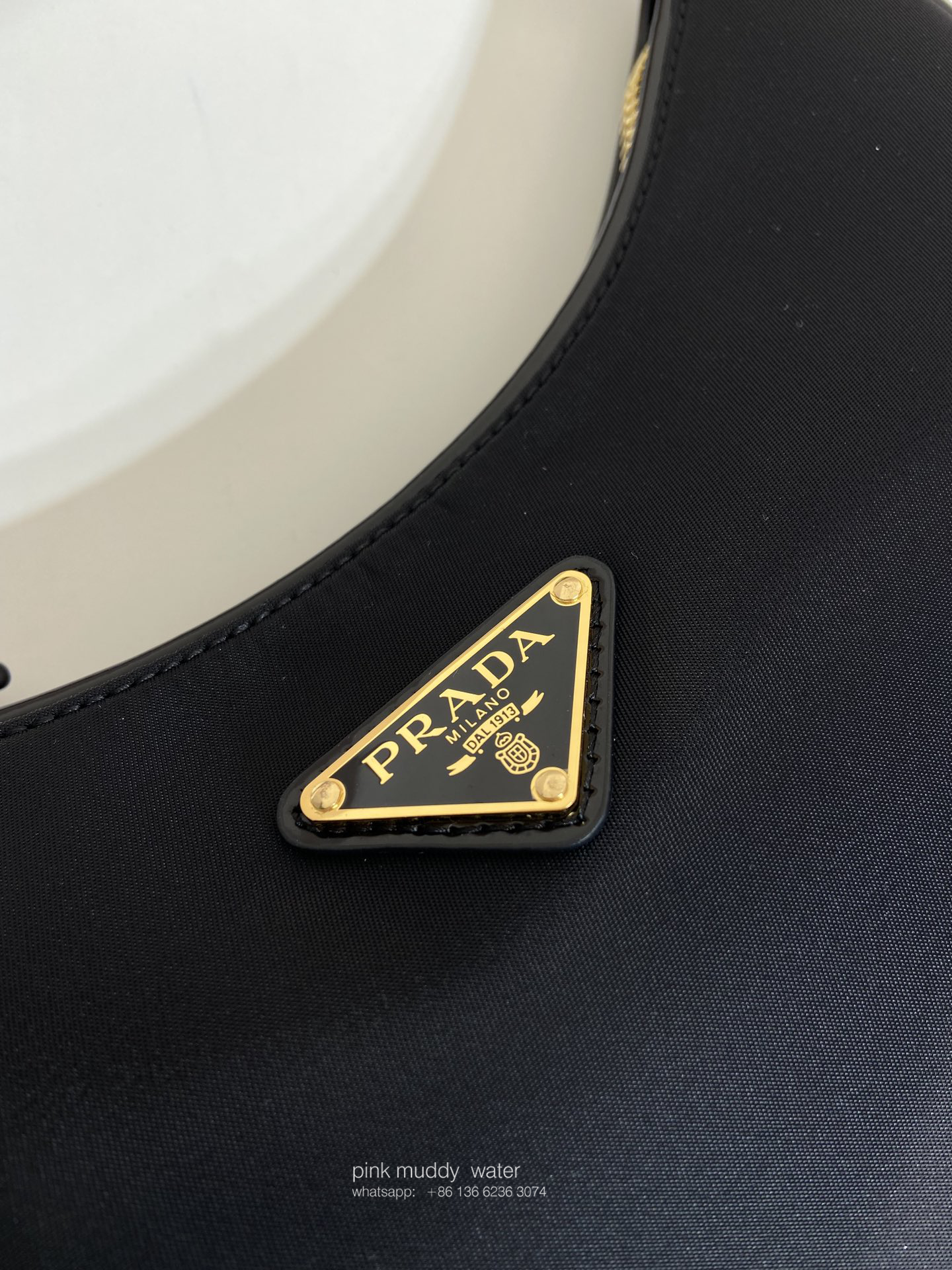 Prada Arqué Re-Nylon and brushed leather mini shoulder bag