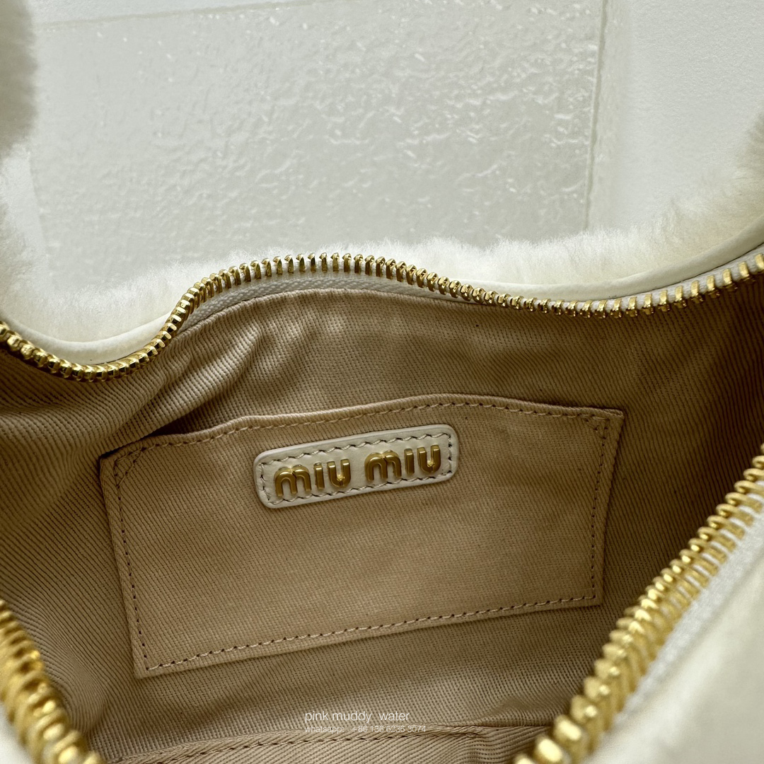 Wander leather detail shearling crescent bag