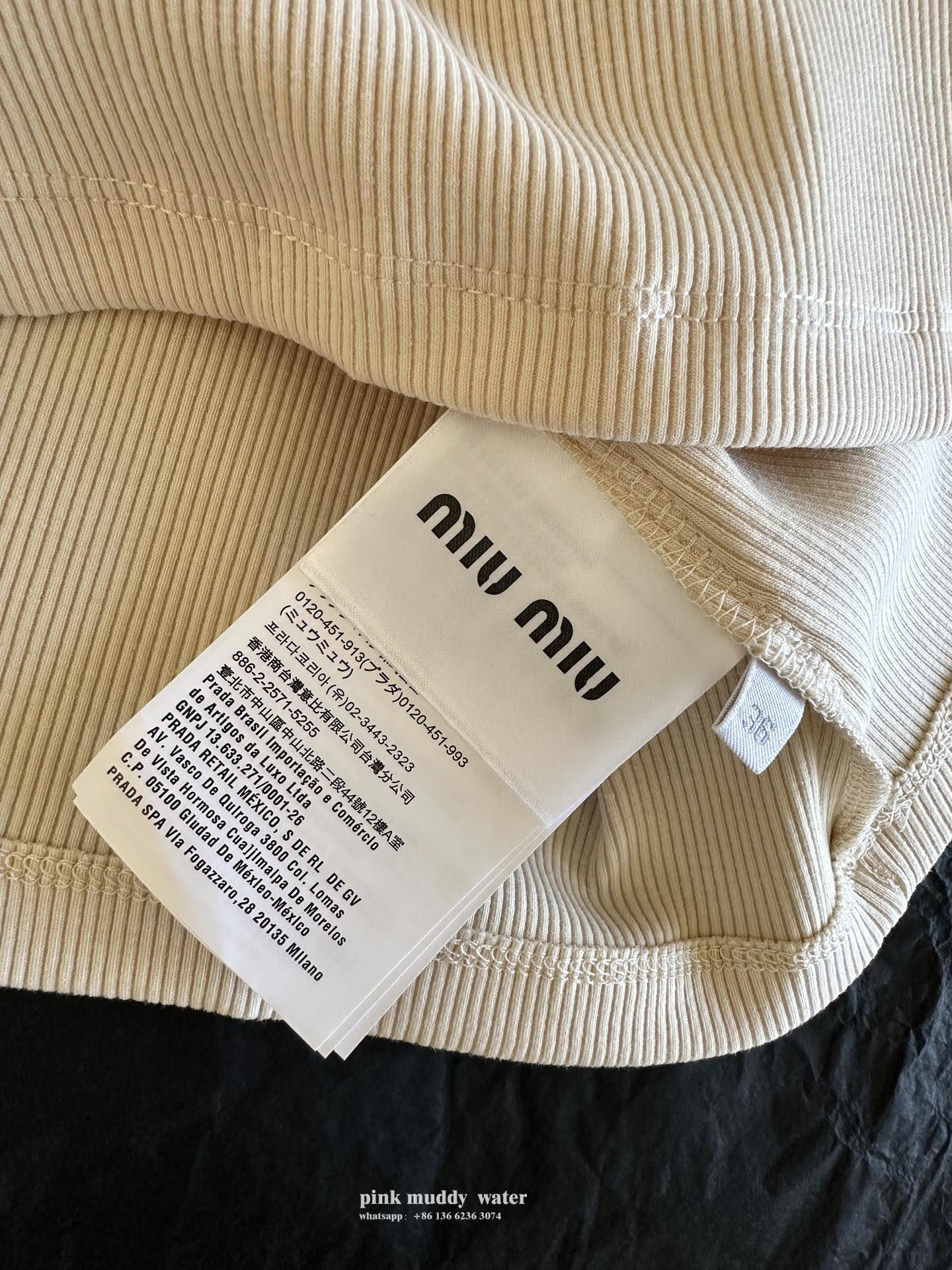 Rib knit top with embroidered logo