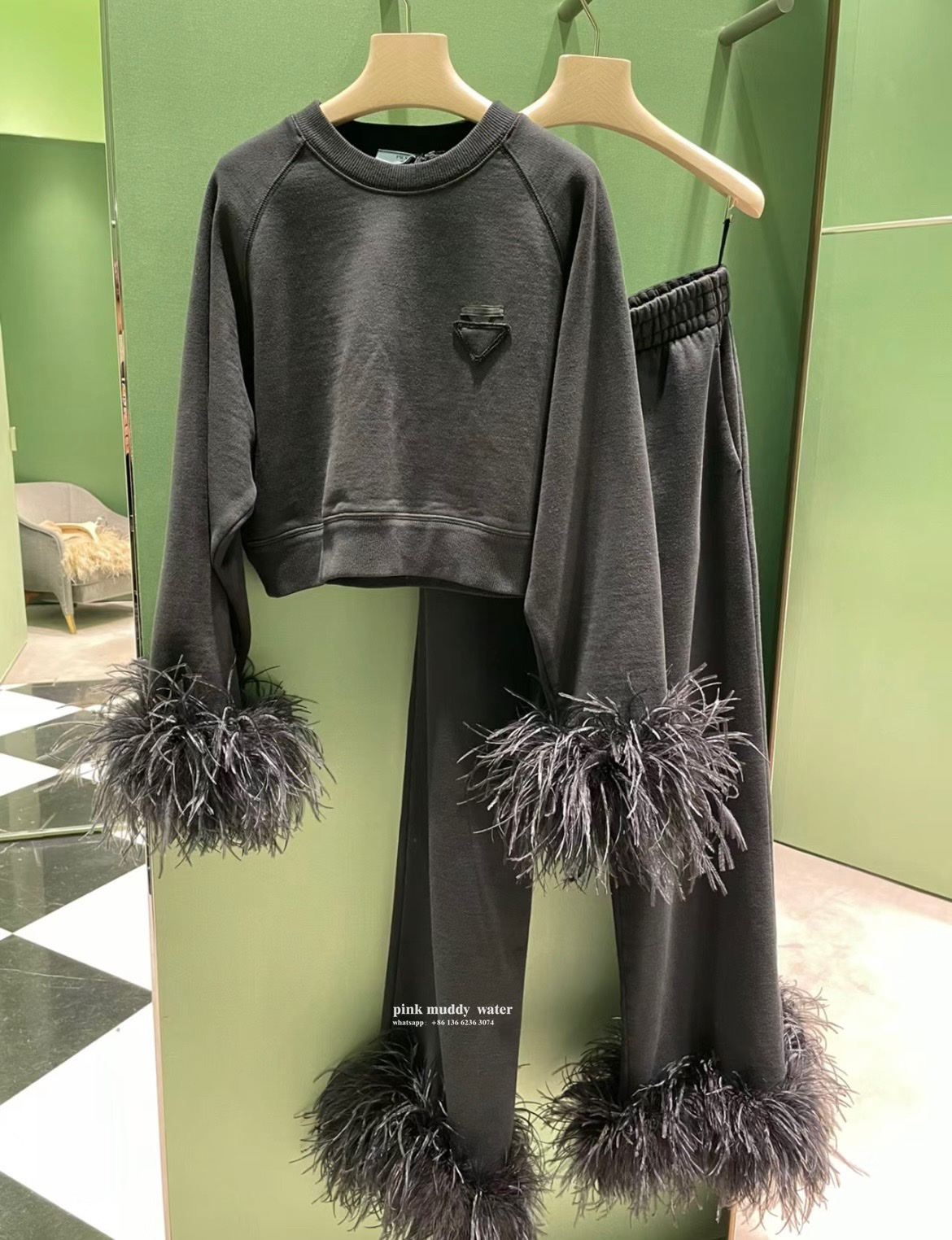 Crew-neck sweatshirt with feather trim