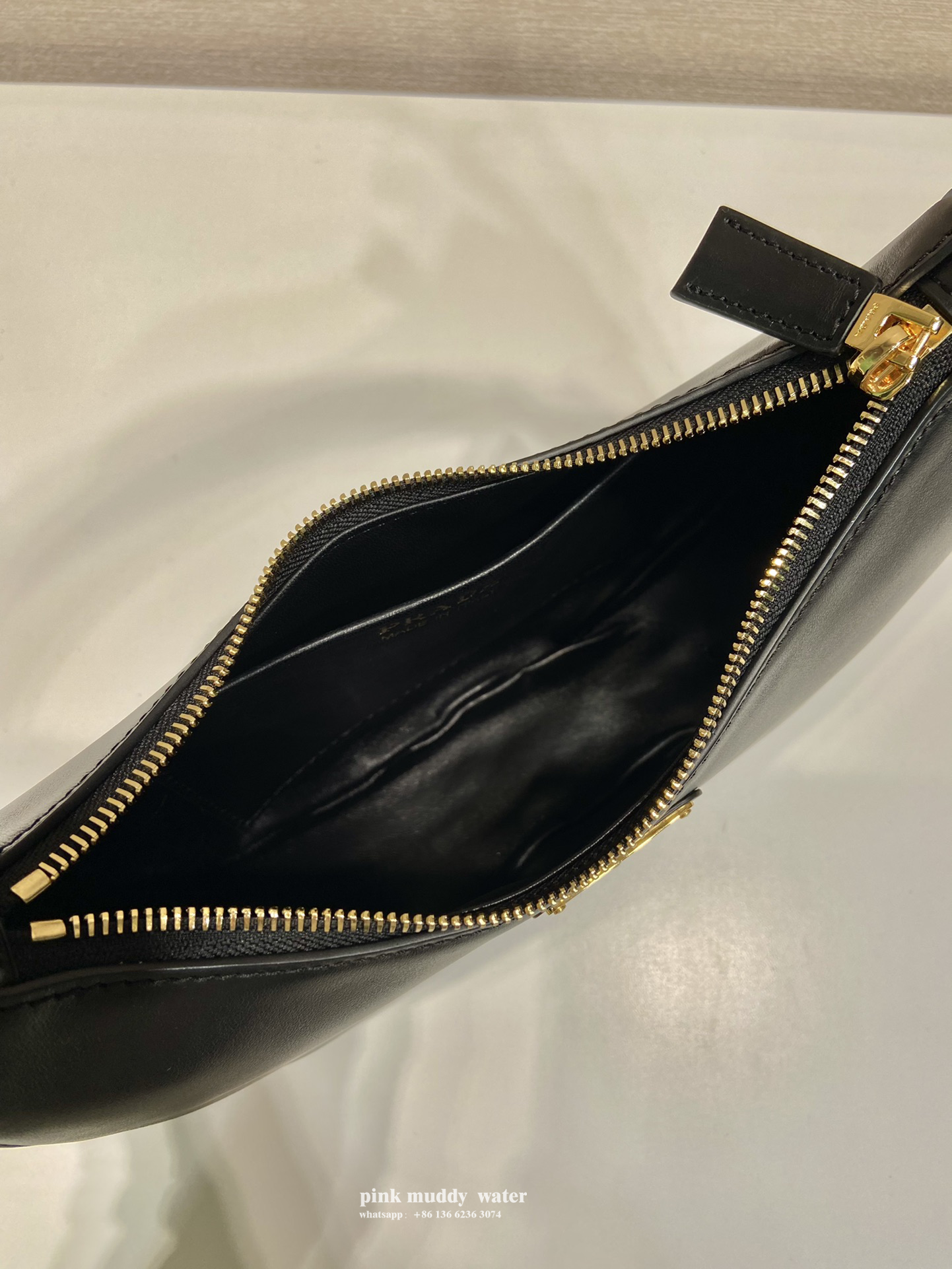 Prada Arqué leather shoulder bag