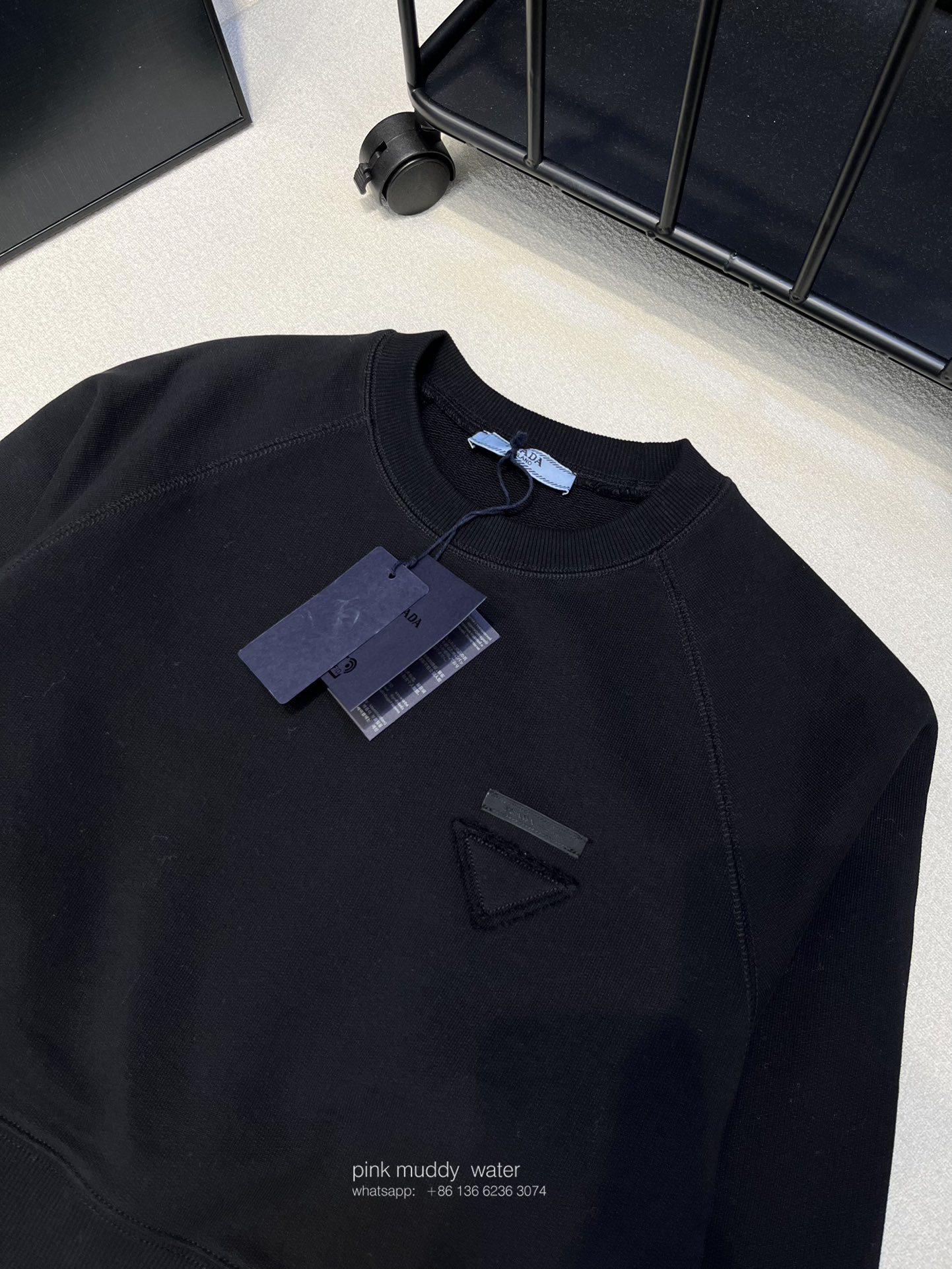 Crew-neck sweatshirt with feather trim