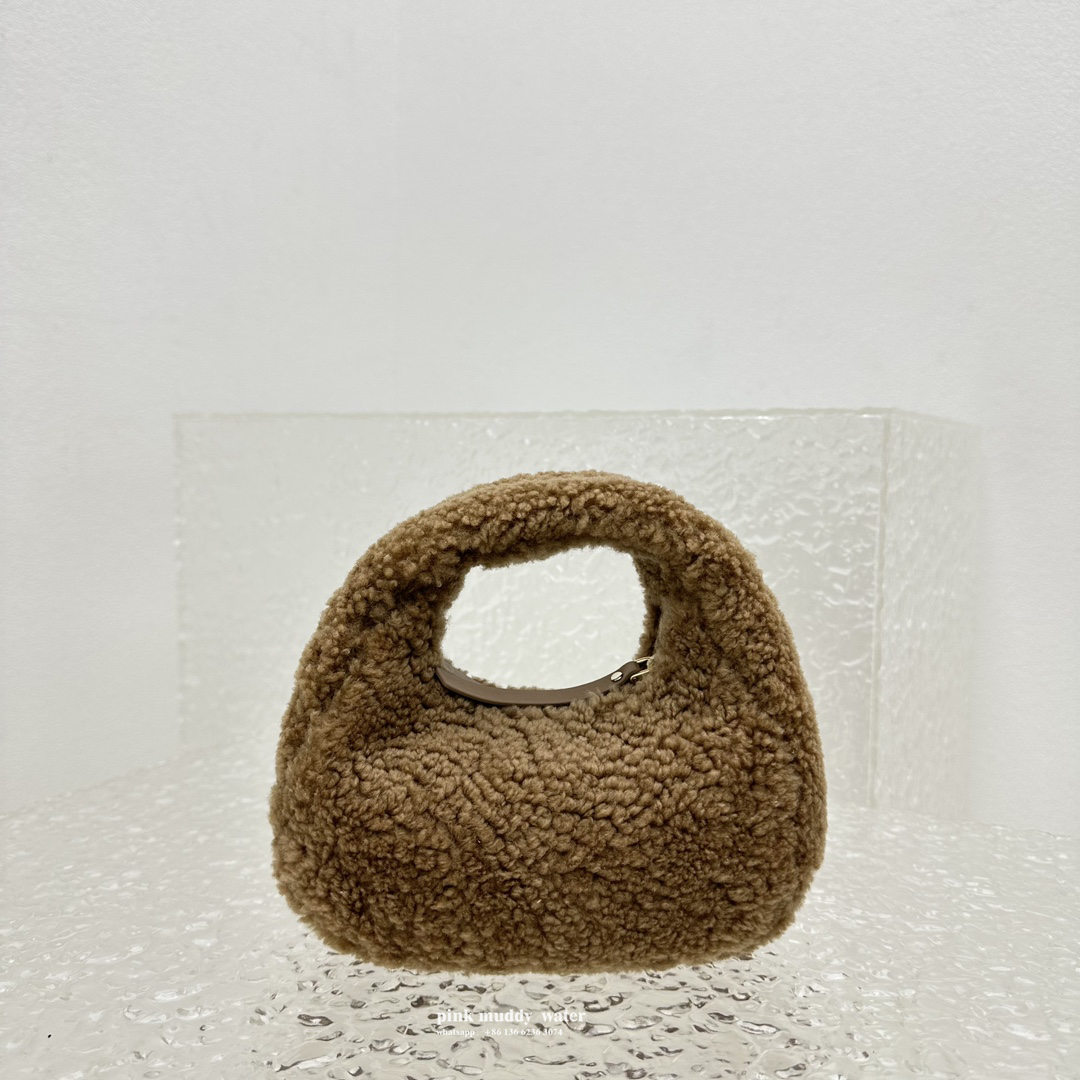 Wander leather detail shearling crescent bag