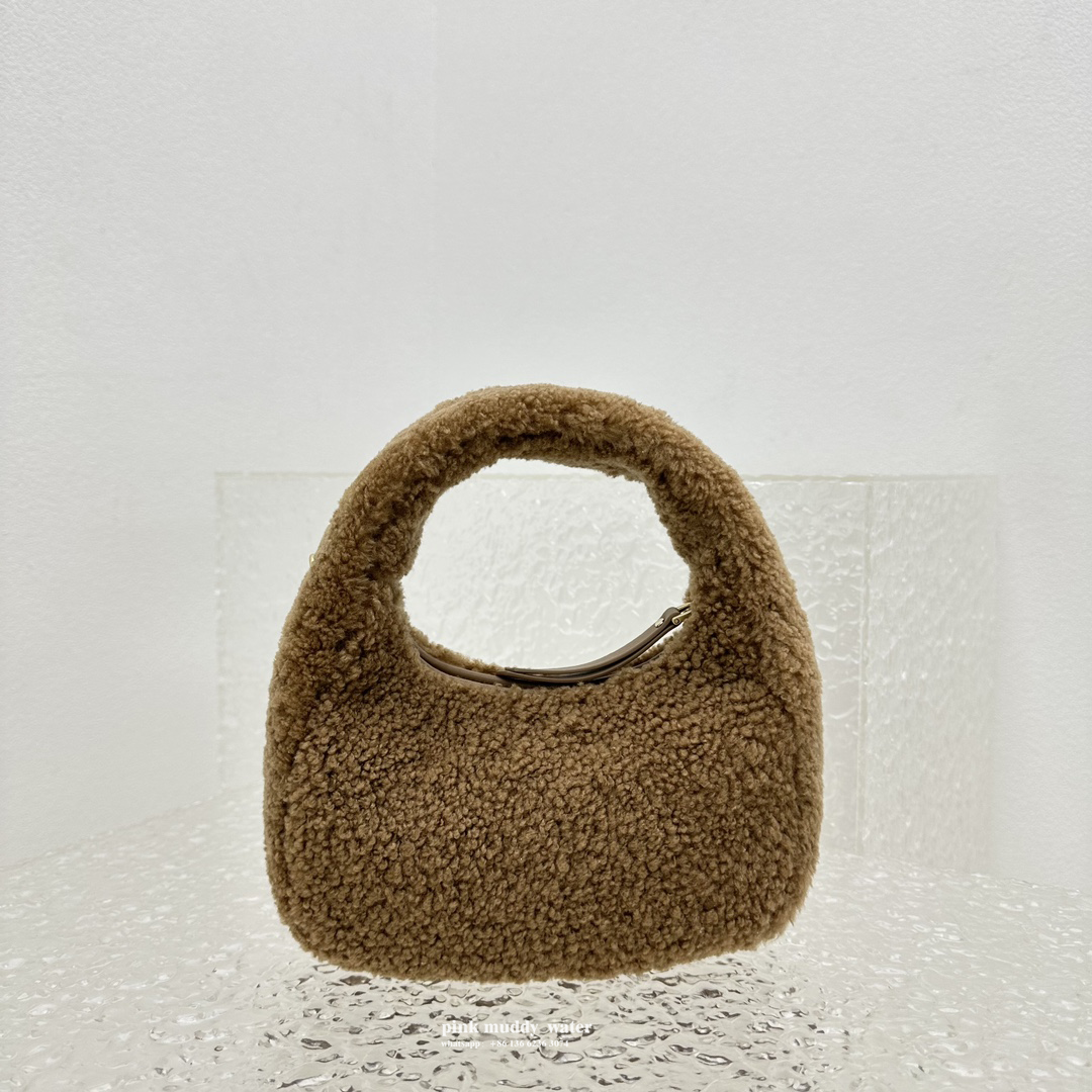 Wander leather detail shearling crescent bag