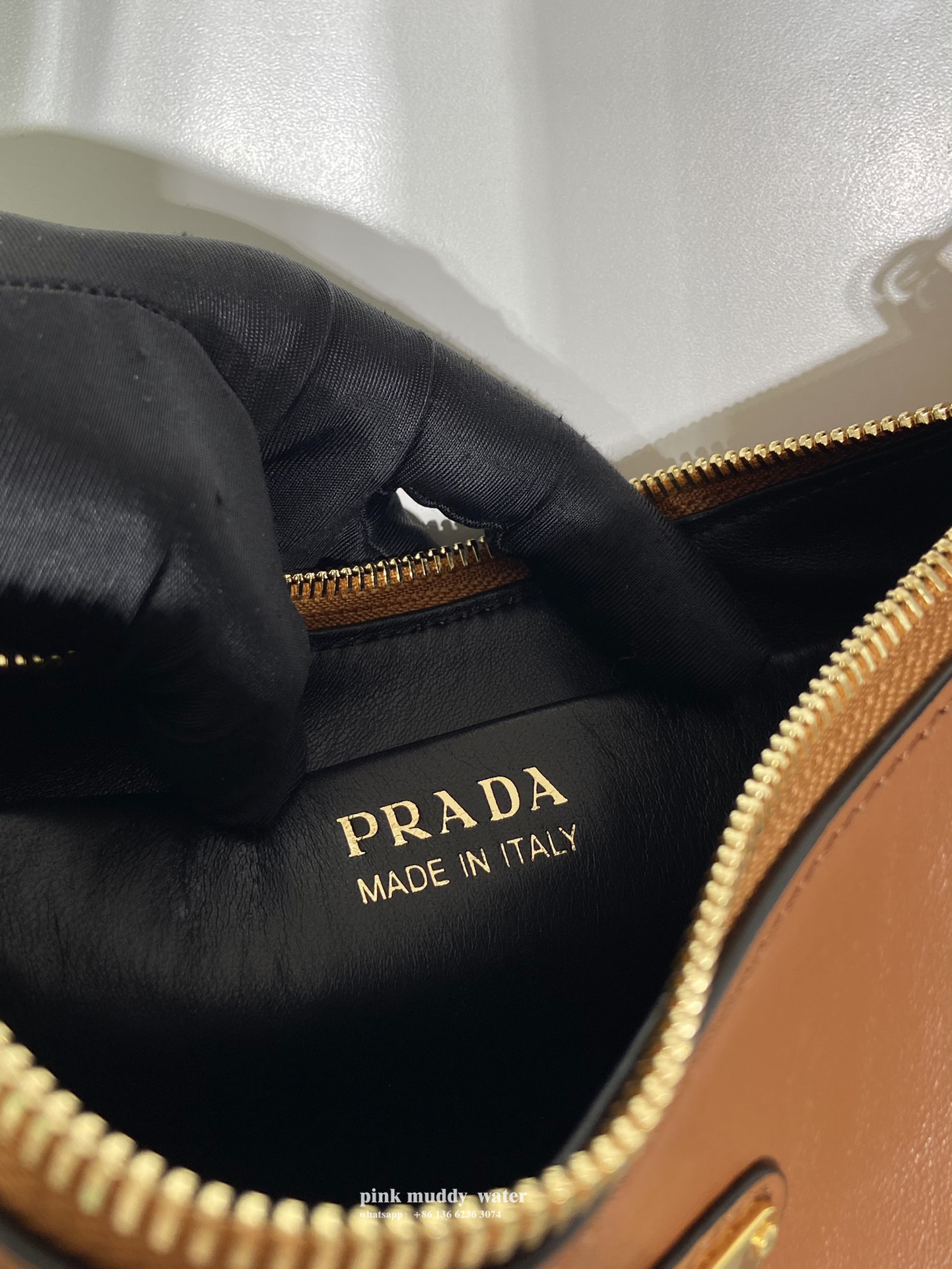Prada Arqué leather shoulder bag