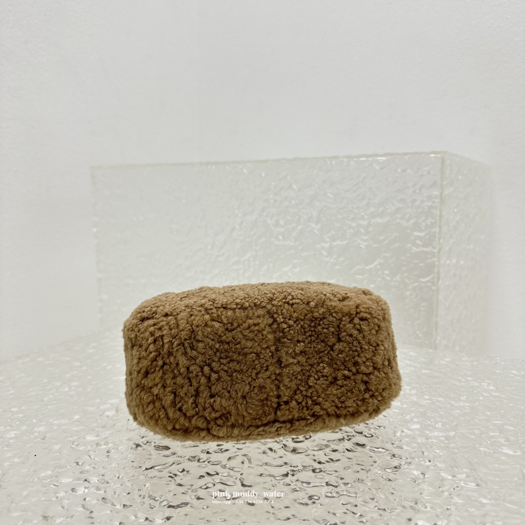 Wander leather detail shearling crescent bag