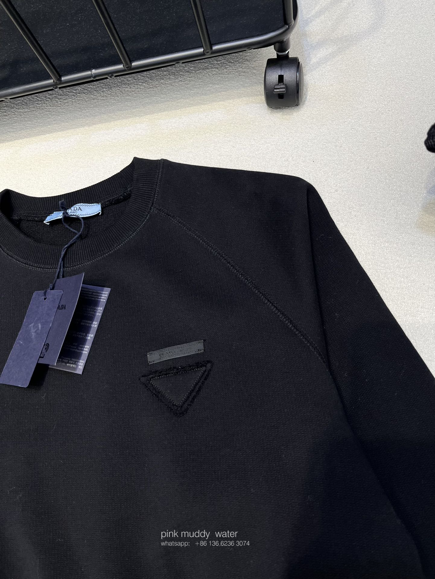 Crew-neck sweatshirt with feather trim