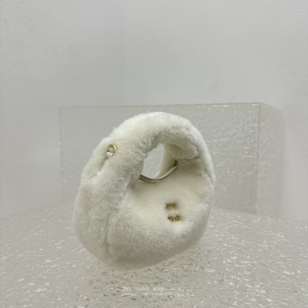 Wander leather detail shearling crescent bag