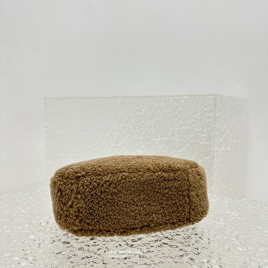 Wander leather detail shearling crescent bag