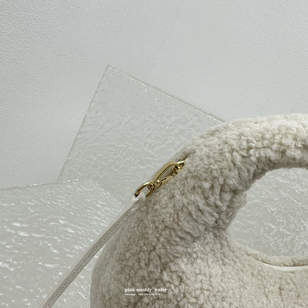 Wander leather detail shearling crescent bag