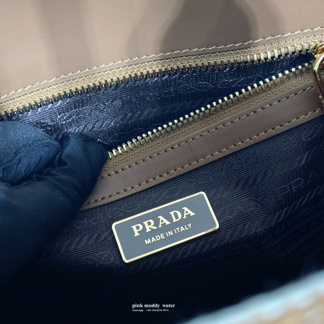 Small Prada Symbole embroidered fabric handbag