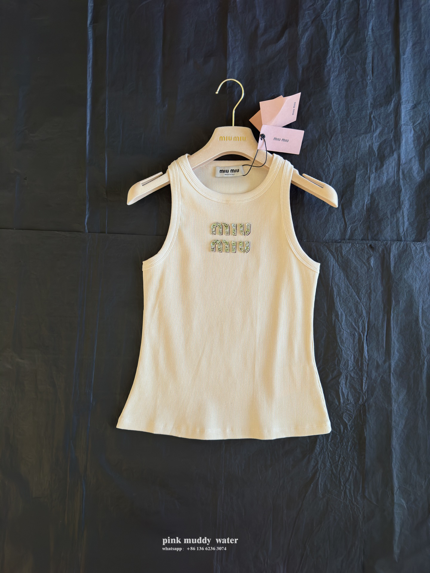 Rib knit top with embroidered logo