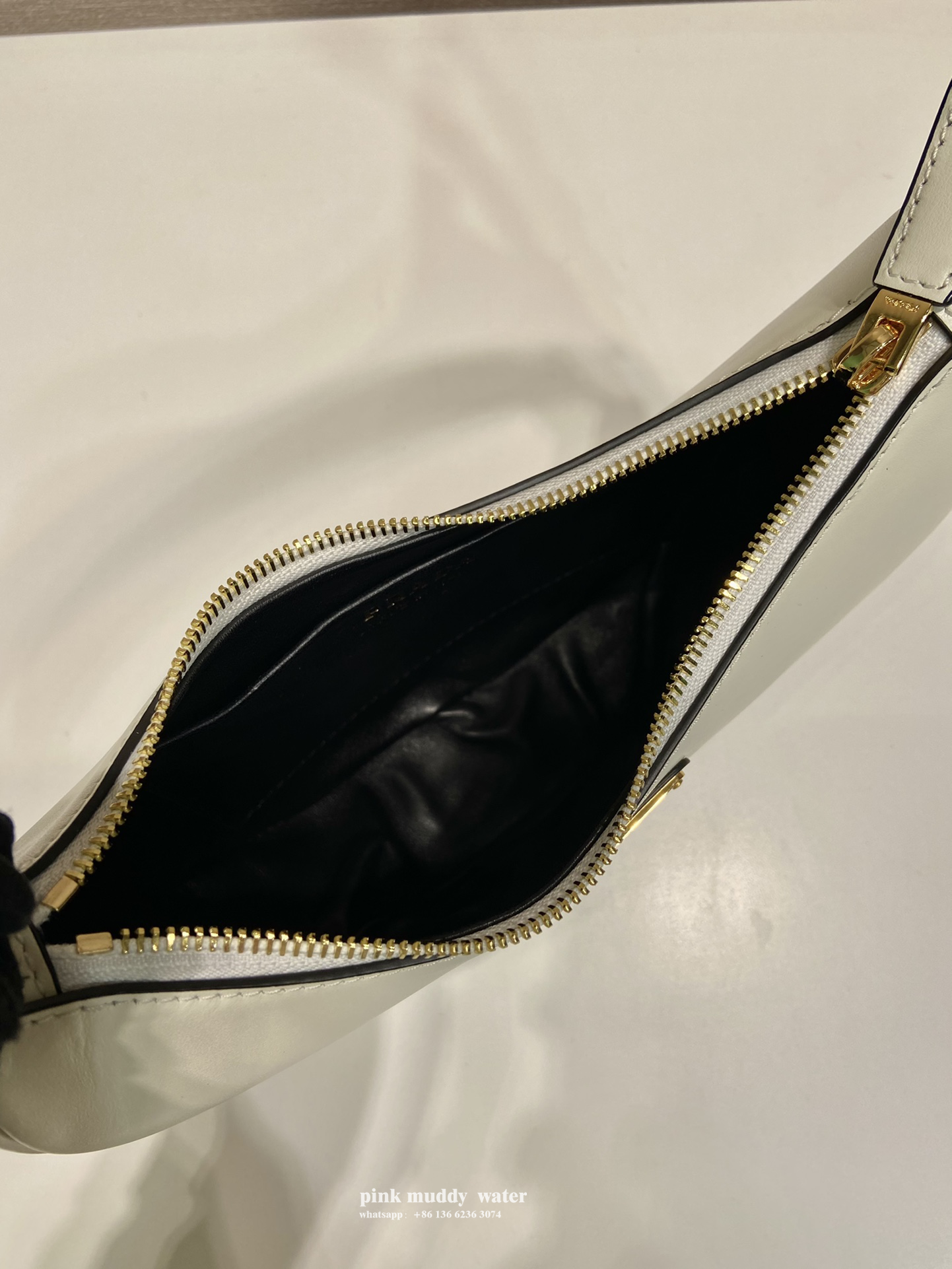 Prada Arqué leather shoulder bag