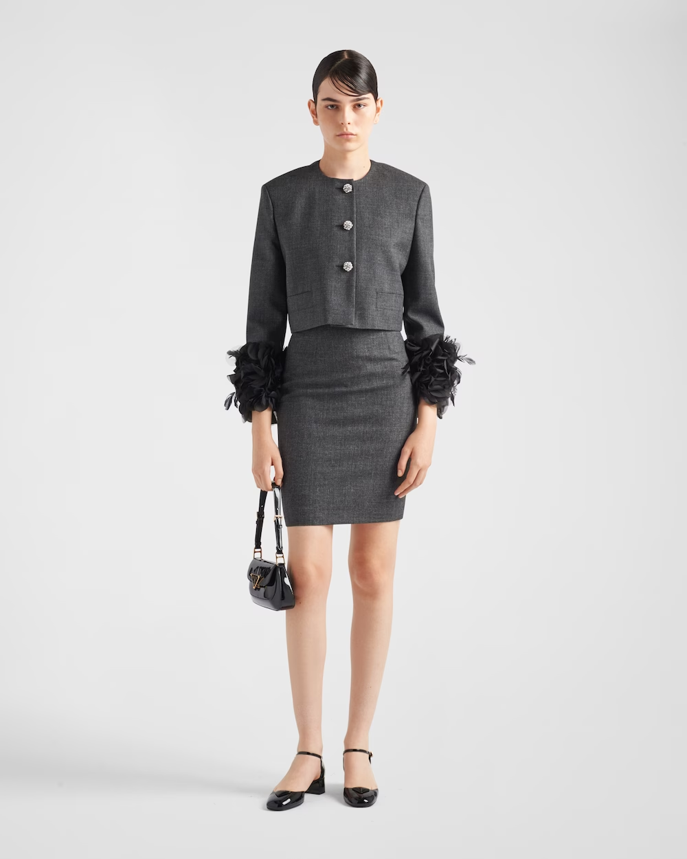 Feather-trimmed single-breasted wool jacket