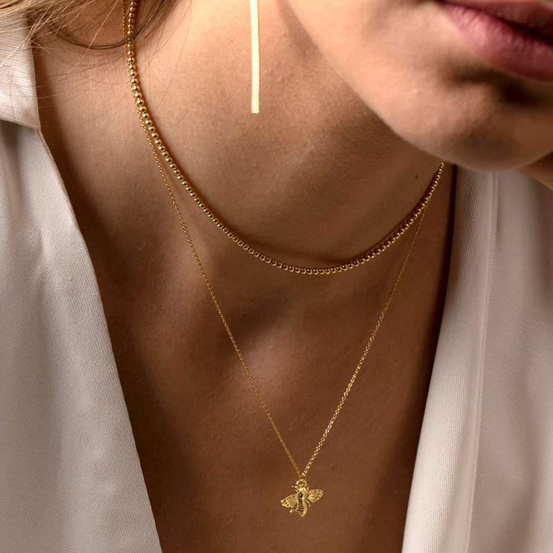 necklace with a bee