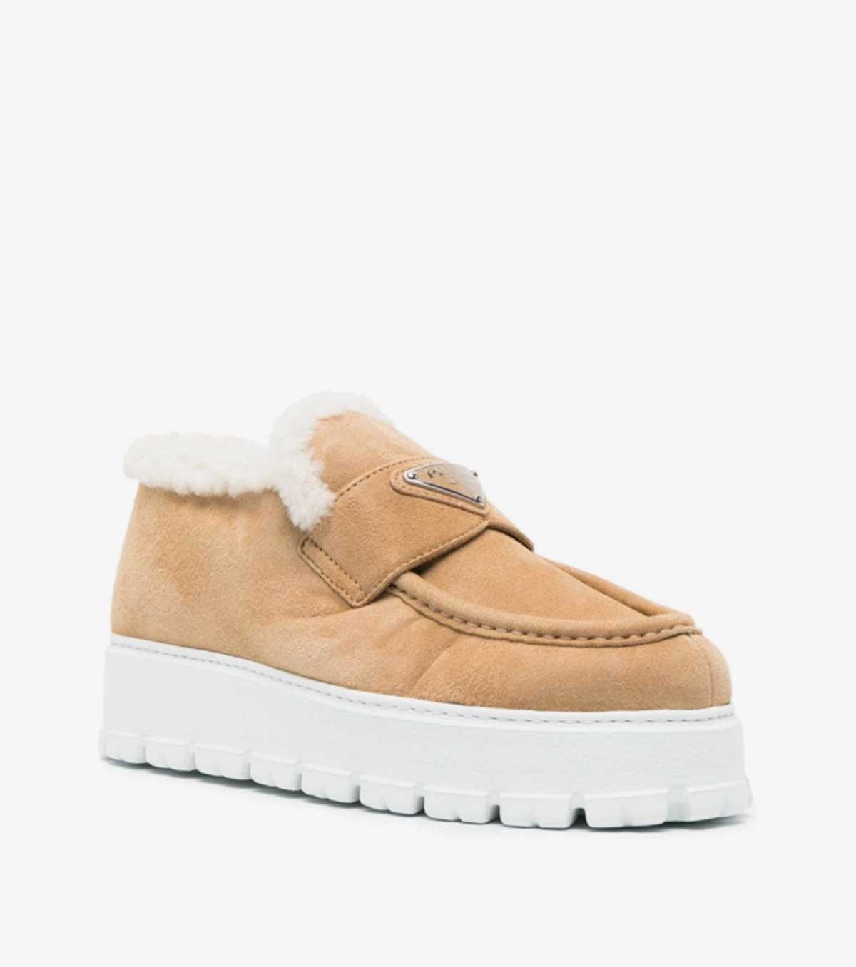 triangle-logo shearling loafers