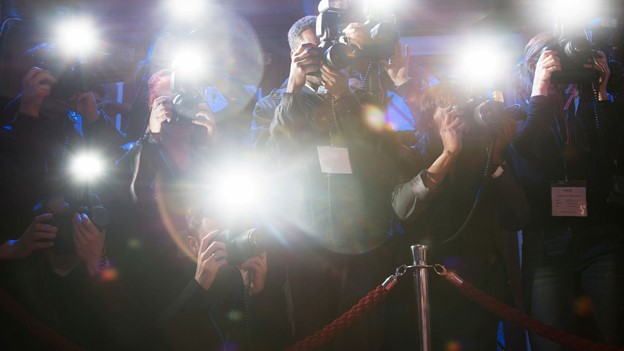 Camera man taking picture of celebrities