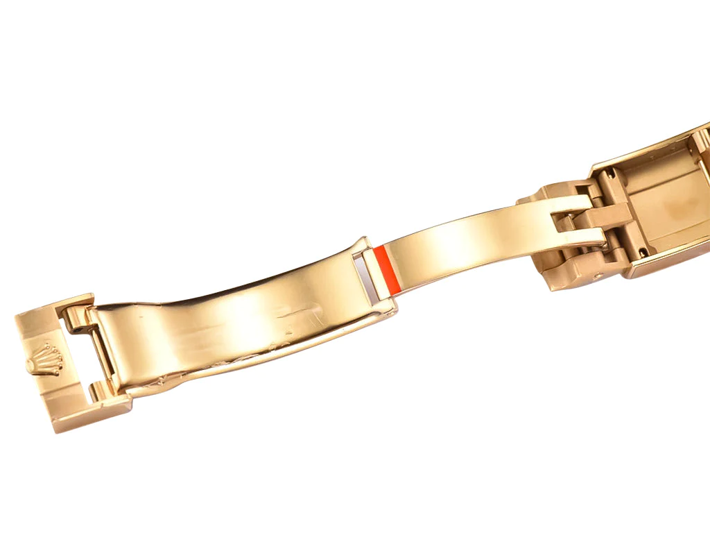 Cosmograph Daytona Yellow Gold Oysterflex with Black and Champagne Dial