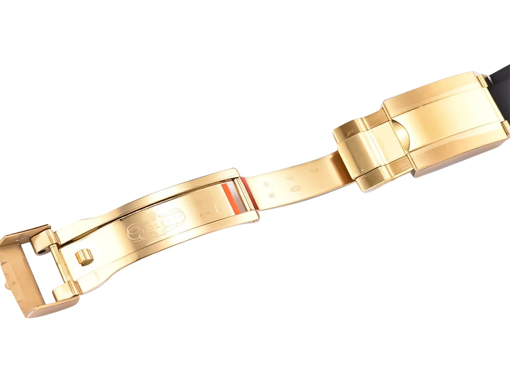 Cosmograph Daytona Yellow Gold Oysterflex with Black and Champagne Dial