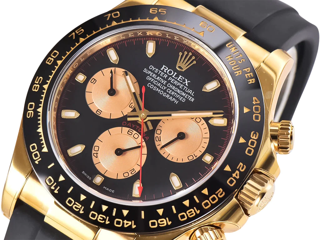 Cosmograph Daytona Yellow Gold Oysterflex with Black and Champagne Dial