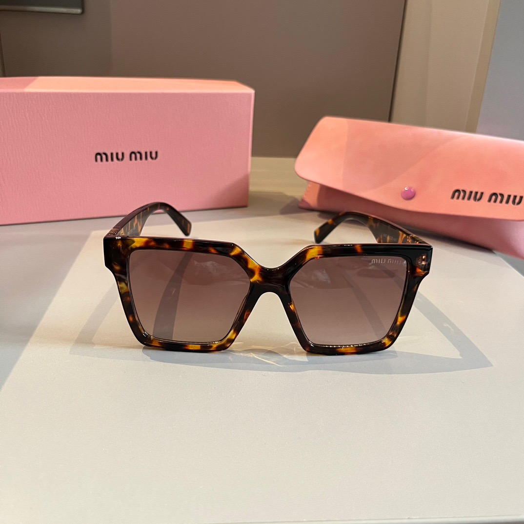 MIUMIU-New black gold Sunglasses