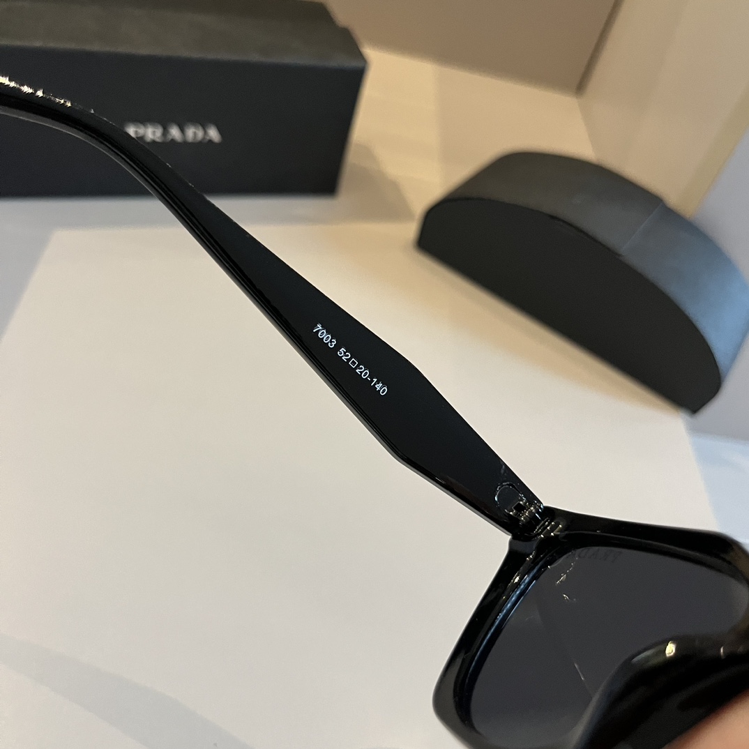 Prada-Angular cat eye Sunglasses
