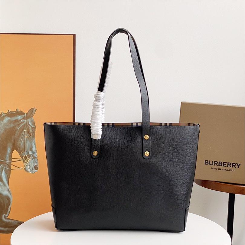 Burberry-Embossed badge leather tote bag