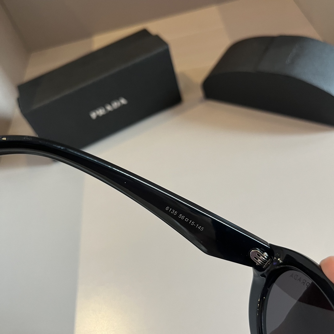 Prada-Symbol Series Narrow Frame Cat Eye Sunglasses