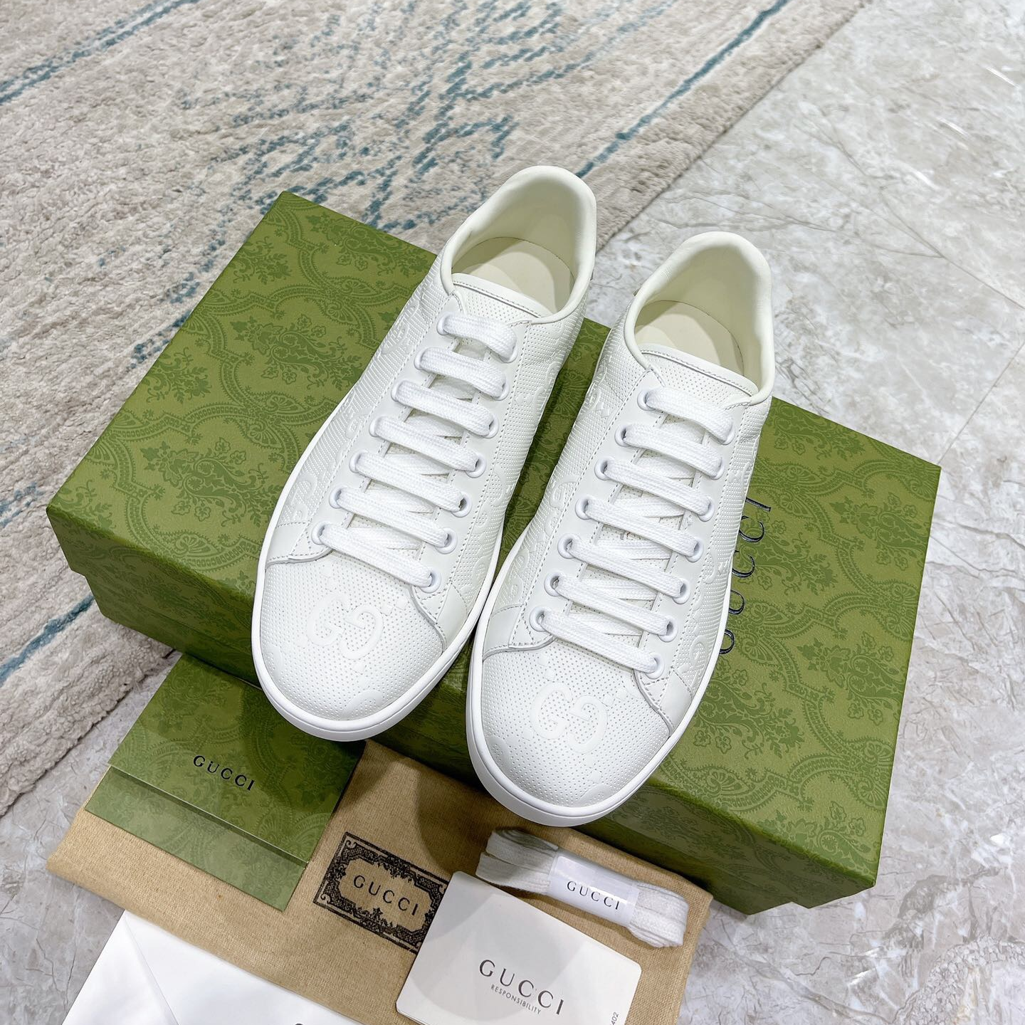 GUCCI - ACE GG Embossed Print Sneakers