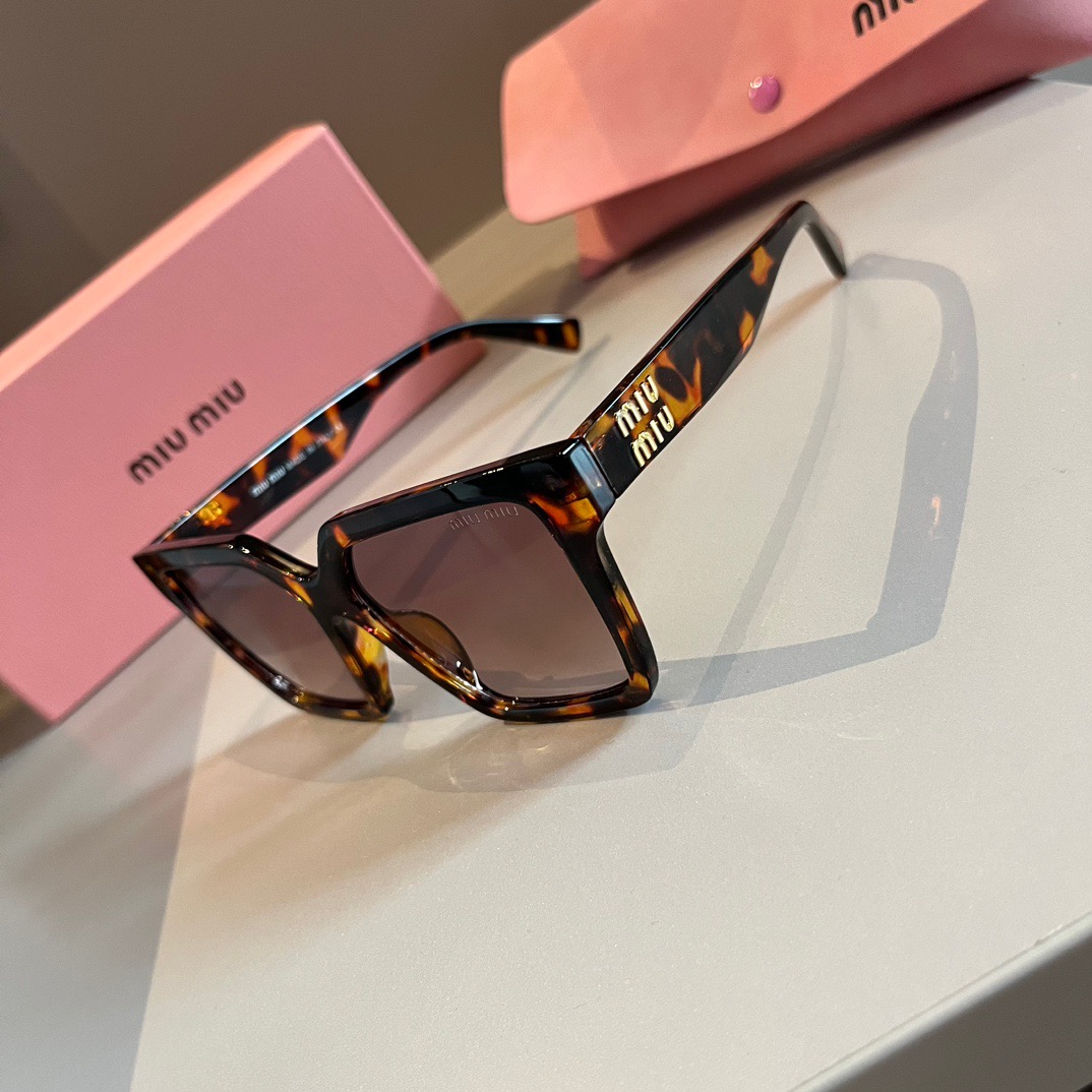 MIUMIU-New black gold Sunglasses