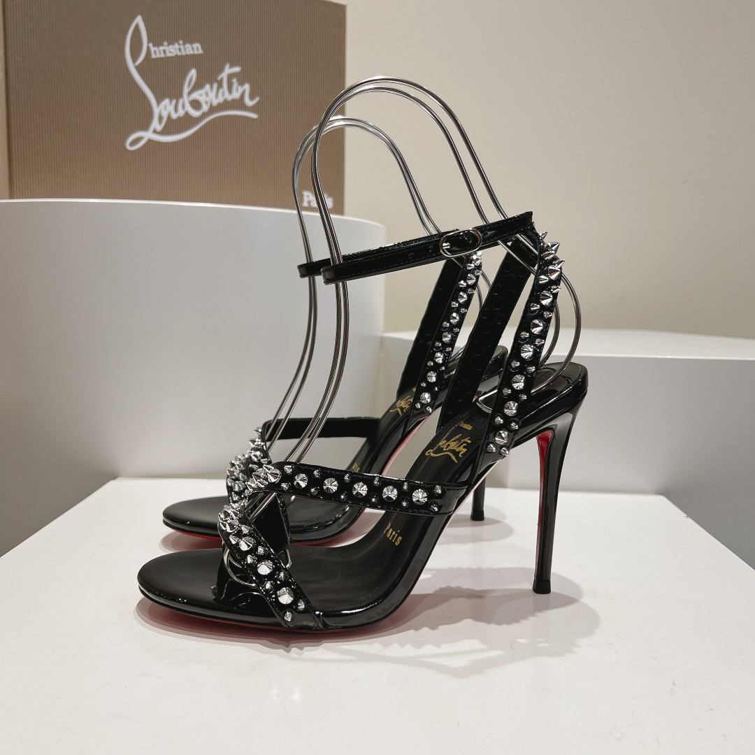 Christian Louboutin-Black high-heeled sandals with diagonal rivets