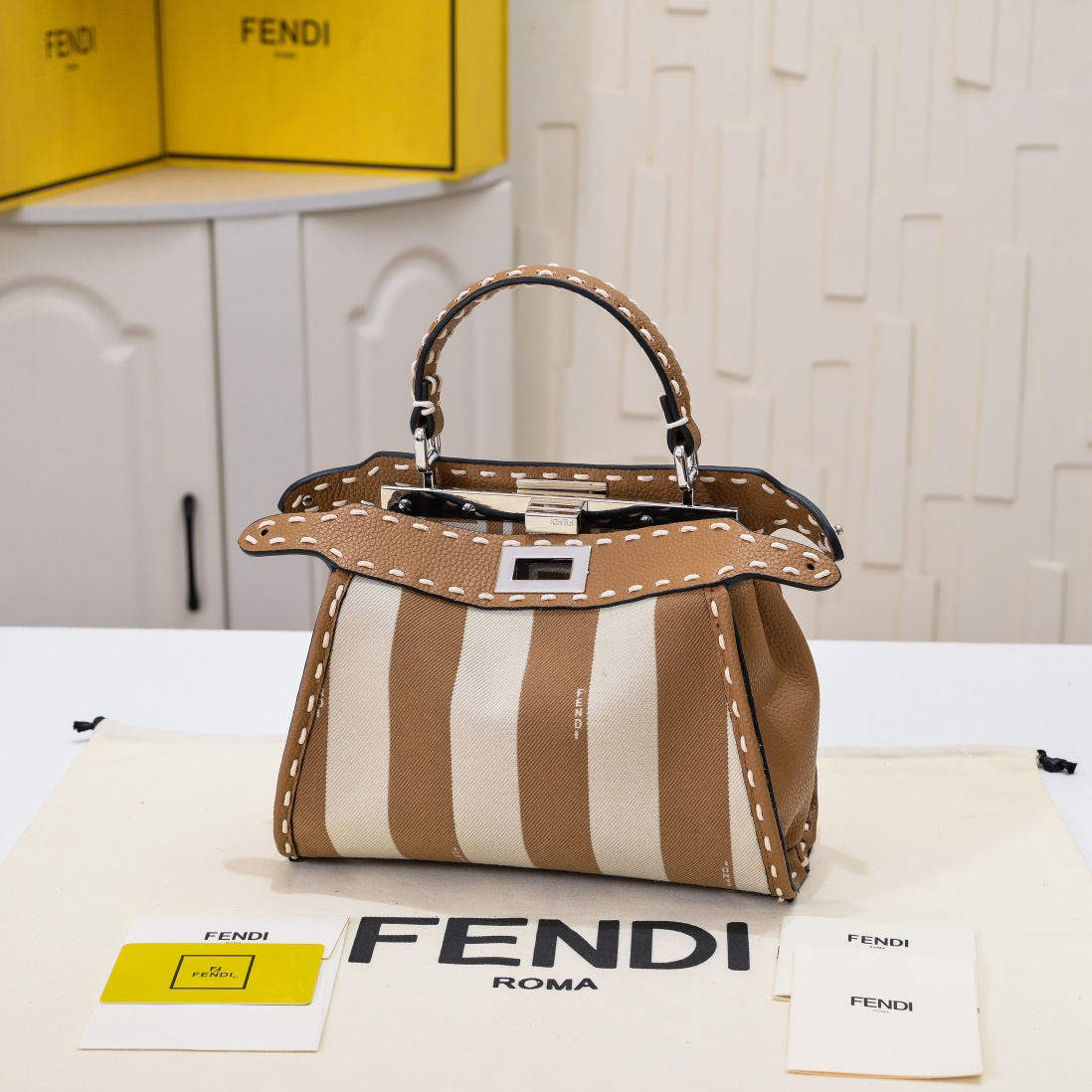 FENDI-Latest striped hand sewn kitten bag