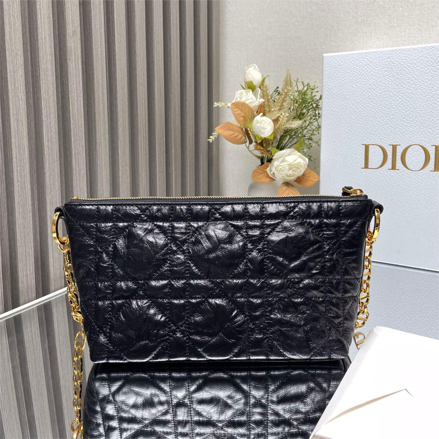 Dior-Hobo chain handbag in black pleated cowhide leather