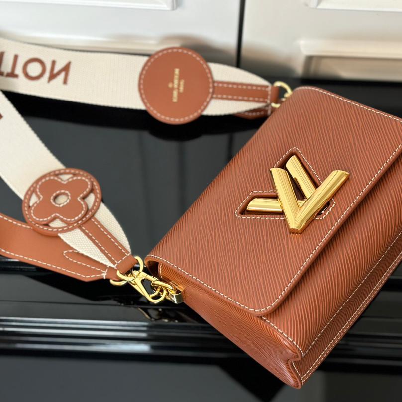 LV-twist traveler small handbag