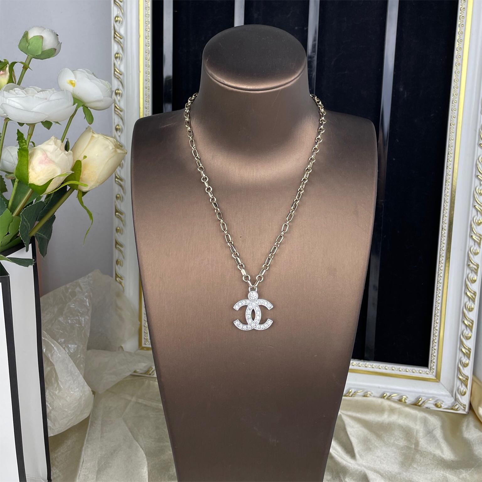 Chanel-Gold and silver contrasting chain white diamond double C pendant necklace