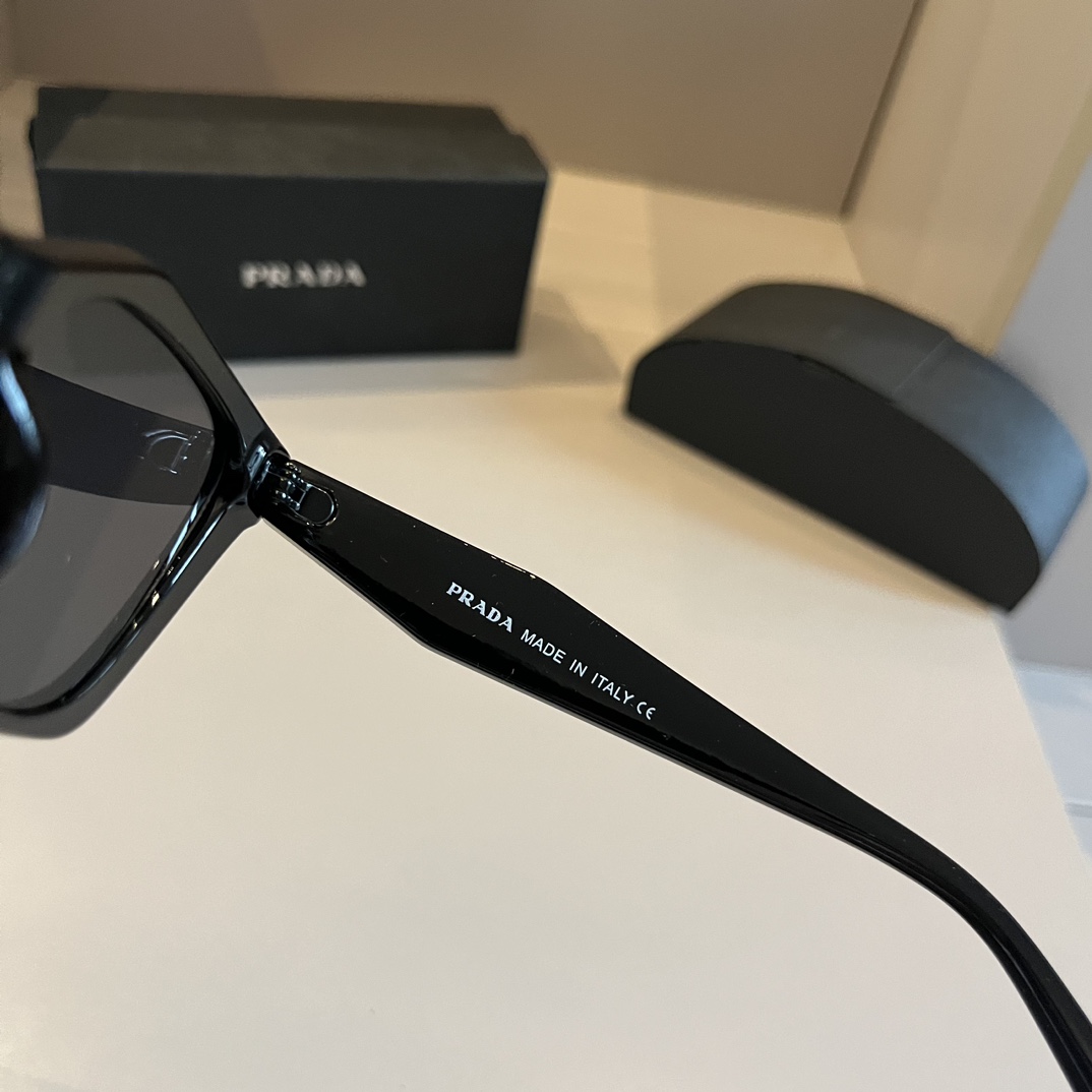 Prada-Angular cat eye Sunglasses