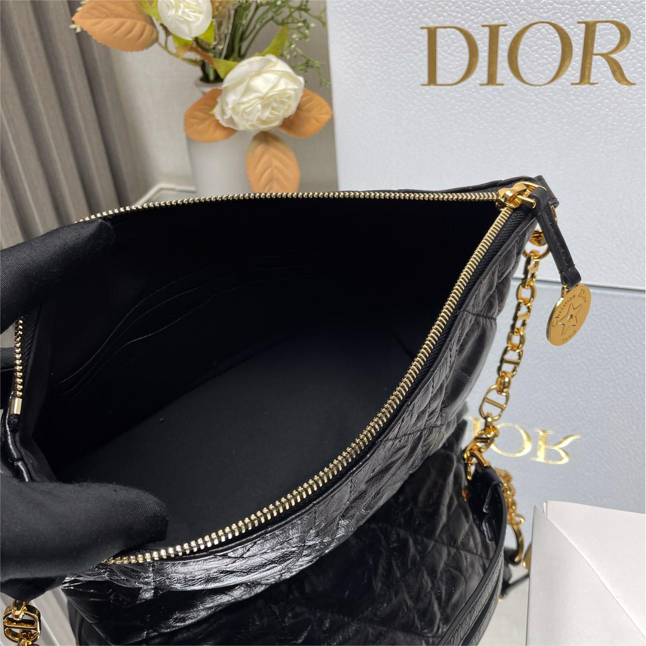 Dior-Hobo chain handbag in black pleated cowhide leather