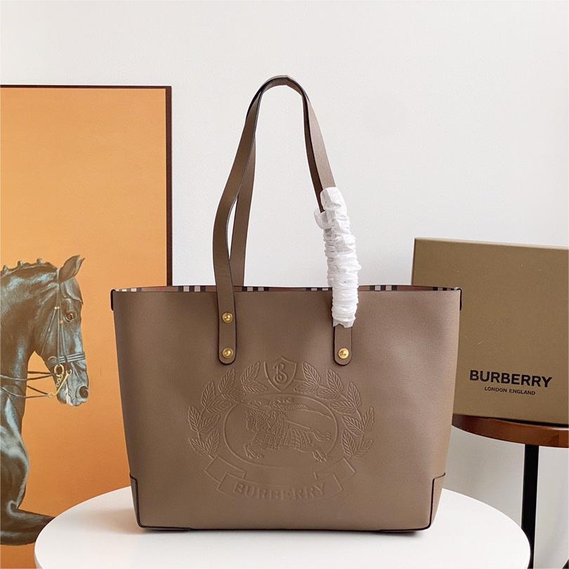 Burberry-Embossed badge leather tote bag