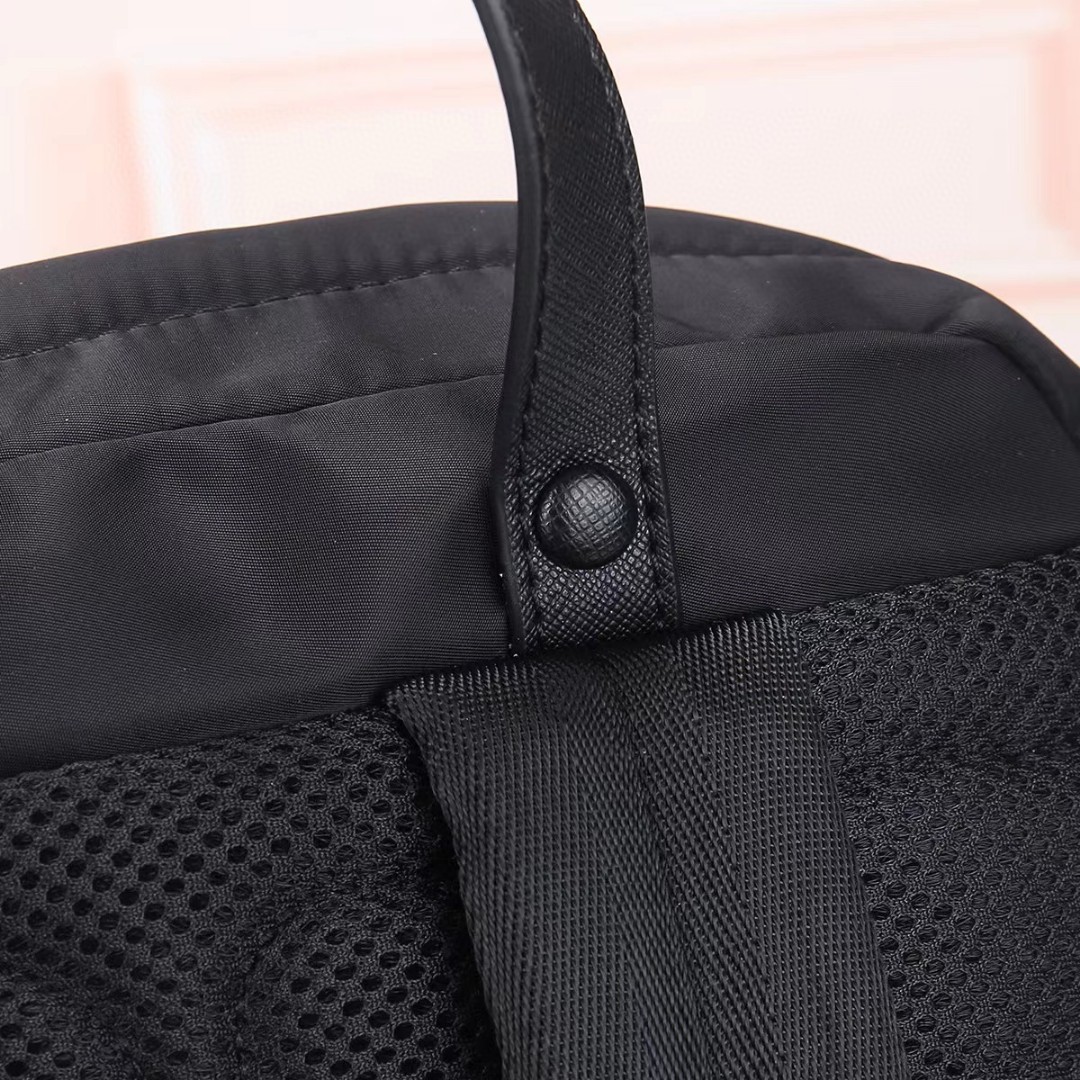 Prada-Triangle logo Safiano leather handle backpack