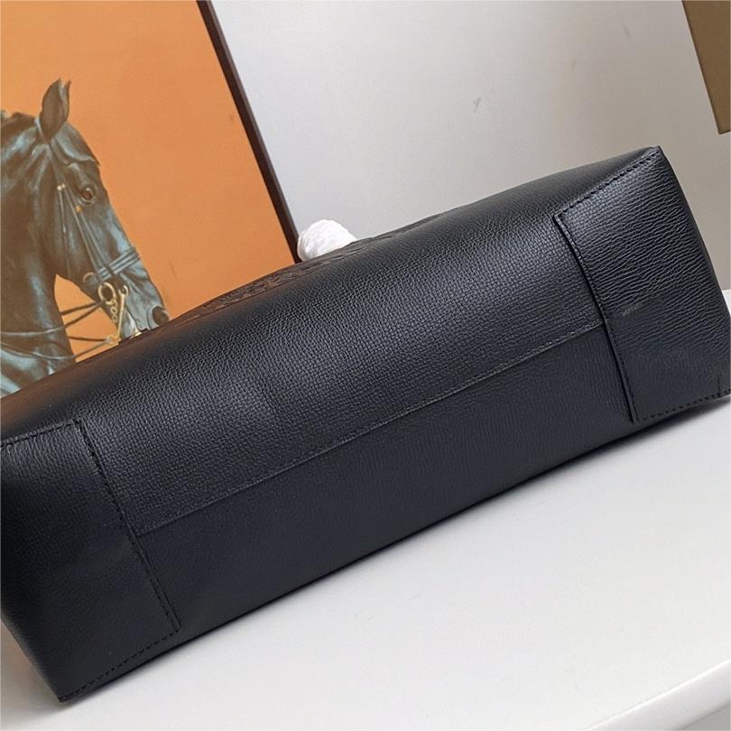 Burberry-Embossed badge leather tote bag