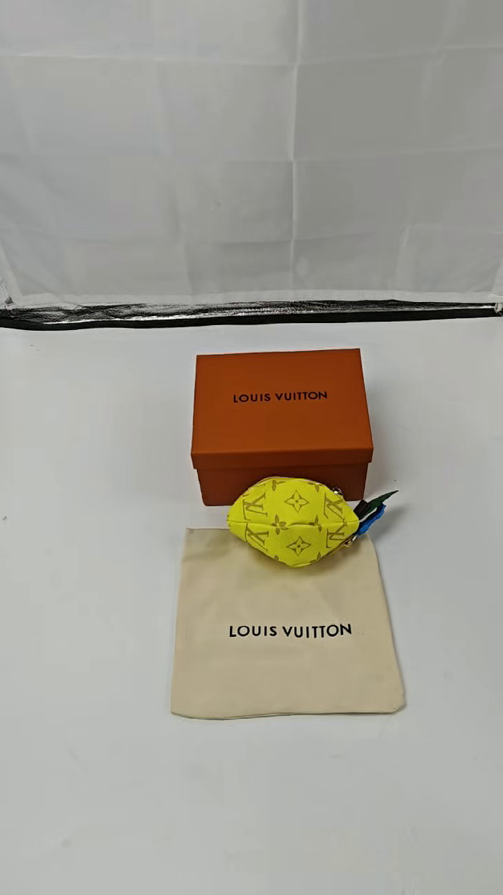LOUIS VUITTON - Classic monogram Lemon shape canvas and cowhide leather Clutch