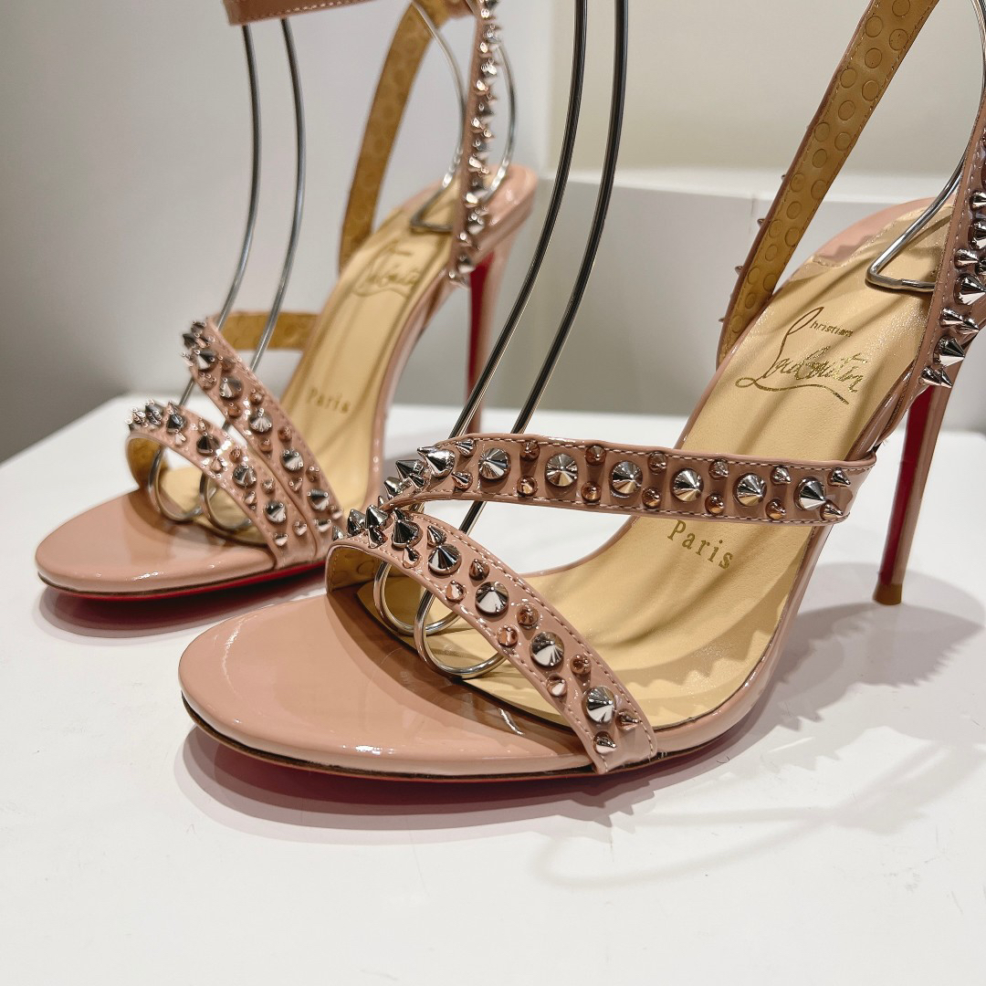 Christian Louboutin-Bare pink high-heeled sandals with diagonal rivets