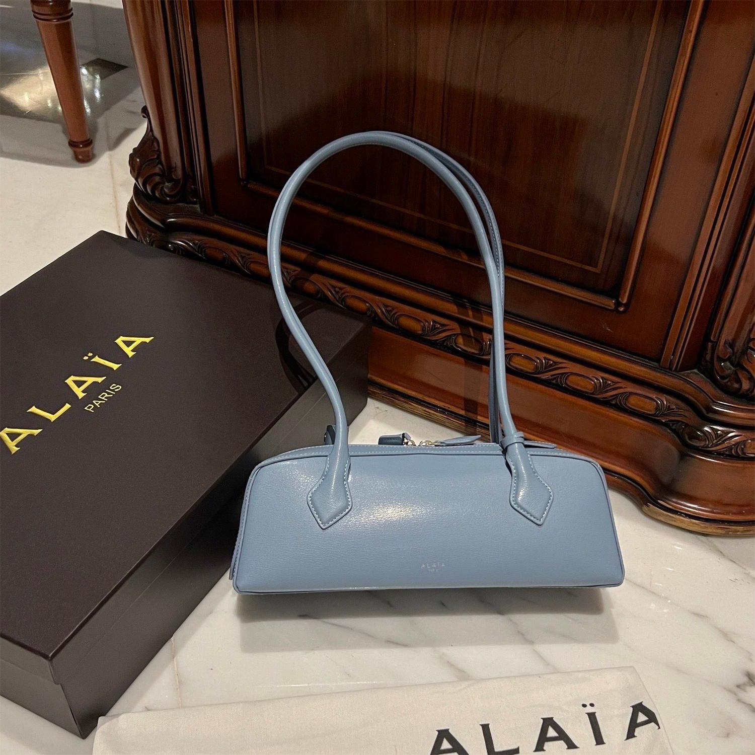 LIAIA-LE TECKEL SMALL BAG IN GOATSKIN Light blue