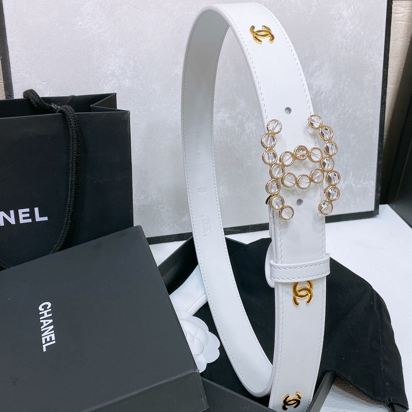 Chanel-Flat leather belt with cowhide pattern