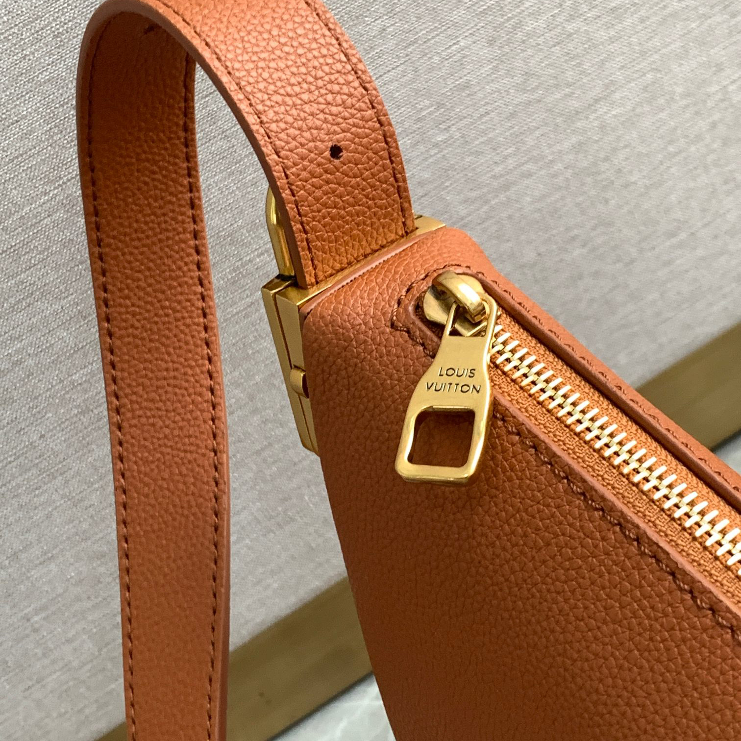 LV- low key leather bag