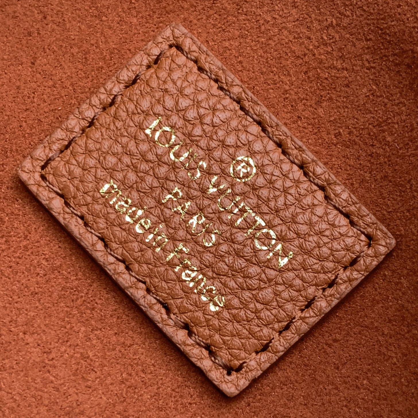 LV- low key leather bag